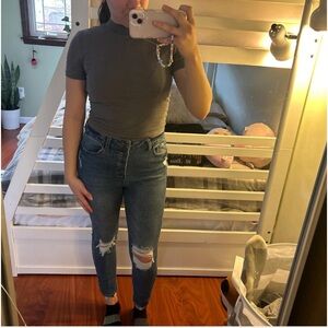 Distressed high-waisted skinny jeans